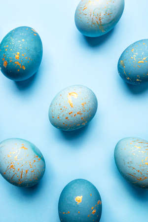 Easter background of eggs painted in blue color. Flat lay, top view.の写真素材
