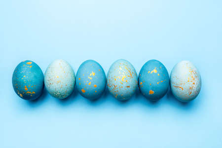 Easter background of eggs painted in blue color. Flat lay, top view.の写真素材