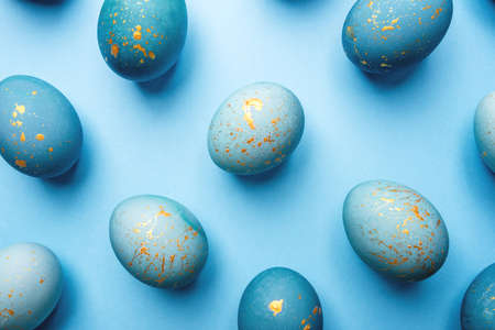 Easter background of eggs painted in blue color. Flat lay, top view.の写真素材