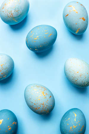 Easter background of eggs painted in blue color. Flat lay, top view.の写真素材