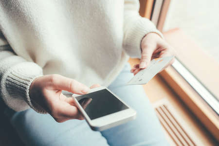 Online payments without leaving your home. The concept of isolation.の写真素材