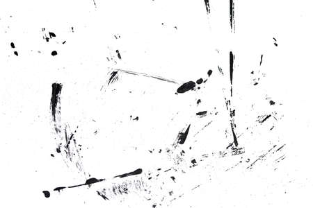Abstract drops and smears of black acrylic paint isolated on a white background.の写真素材