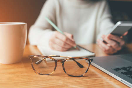 Young woman working in a home office. Remote work concept.