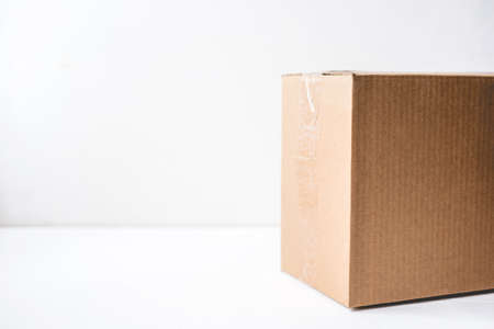 Cardboard box on white background. Copy space for text.の写真素材