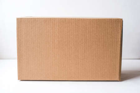 Cardboard box on white background. Copy space for text.の写真素材