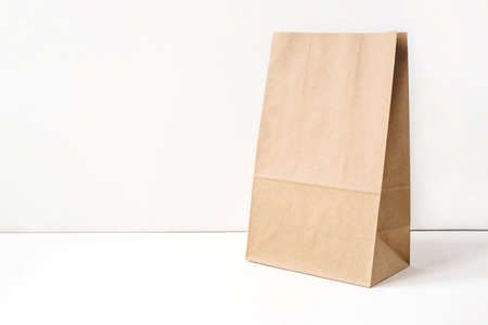 Paper craft bag on a white background. Copy space for text.の写真素材