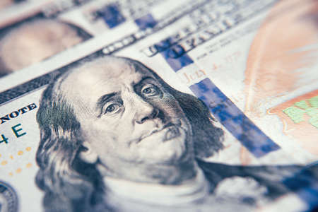American cash dollars close-up. One Hundred Dollar Banknotes. Soft focus image.の写真素材