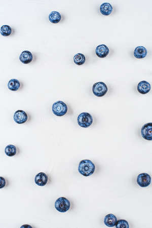 Pattern of fresh blueberries on gray background. Close up, top view.の写真素材