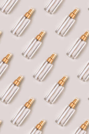 Pattern of bottles with a cosmetic product for skin or hair care. Flat lay, top view.の写真素材