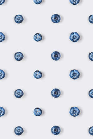 Pattern of fresh blueberries on gray background. Close up, top view.の写真素材
