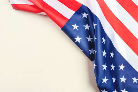American flag on a gray background. US independence day. Copy space for text.