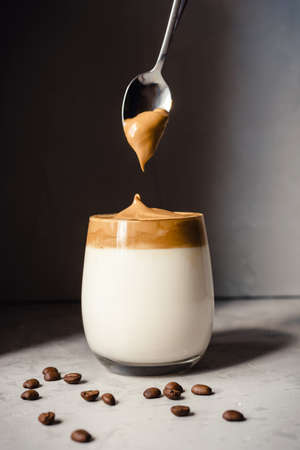Homemade Dalgona coffee. A trendy drink from Korea on the basis of instant coffee.の写真素材