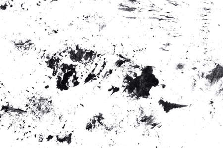 Abstract drops and smears of black acrylic paint isolated on a white background.の写真素材