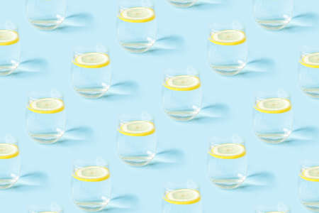 Summer pattern with glasses of lemonade on blue background.の写真素材