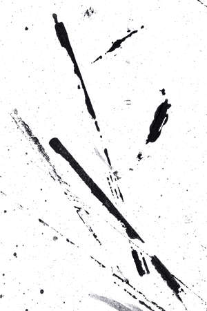 Abstract drops and smears of black acrylic paint isolated on a white background.の写真素材