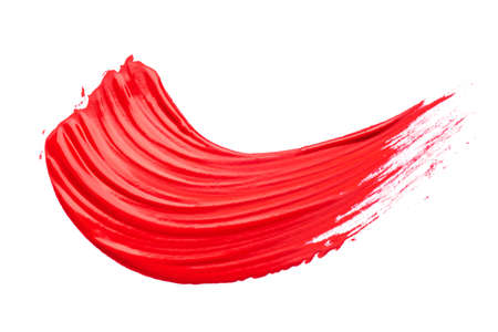 Red acrylic brushstroke isolated on a white background.の写真素材