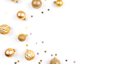 Festive white background with gold Christmas decorations. Flat lay, top view. Copy space for text.の写真素材