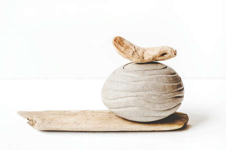 Handmade ceramics in the style of wabi sabi. Brown clay jar with an abstract pattern.の写真素材