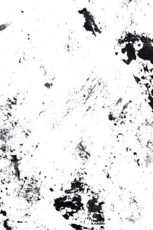 Abstract drops and smears of black acrylic paint isolated on a white background.の写真素材