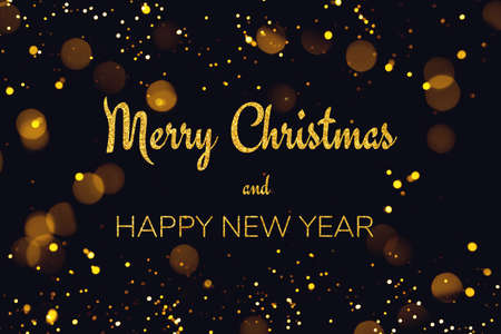 Golden abstract bokeh on black background. Holiday concept.の写真素材