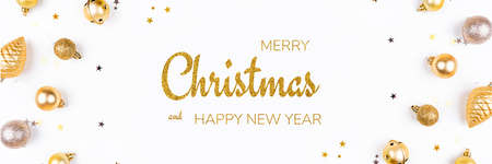 Festive white background with gold Christmas decorations. Flat lay, top view.の写真素材