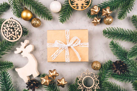 Christmas background of fir tree branches and decorations. The concept of the winter holidays. Flat lay, top view.の写真素材