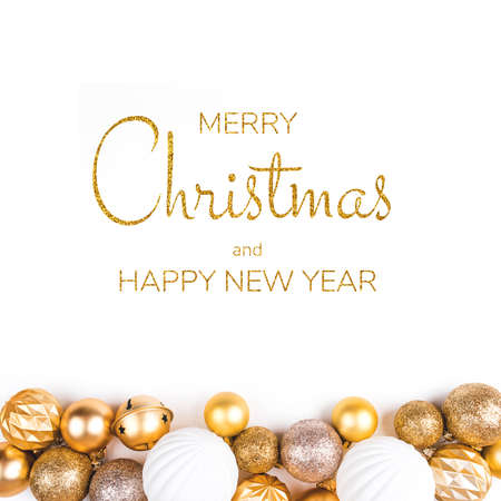 Festive white background with gold Christmas decorations. Flat lay, top view.の写真素材
