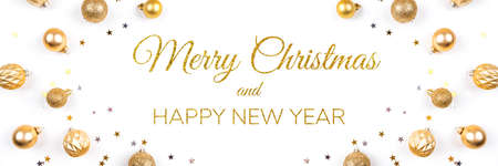 Festive white background with gold Christmas decorations. Flat lay, top view.の写真素材