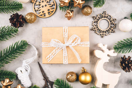 Christmas background of fir tree branches and decorations. The concept of the winter holidays. Flat lay, top view.の写真素材