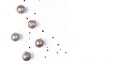 Festive white background with gold Christmas decorations. Flat lay, top view. Copy space for text.の写真素材