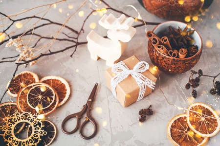 The figure of the reindeer, gift box and dry spices. Christmas decor, winter mood, holiday decoration.の写真素材