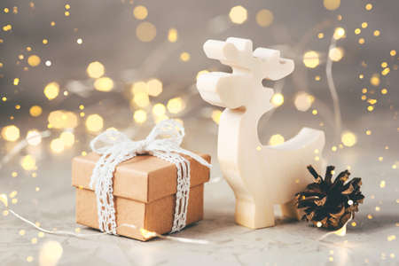The figure of the reindeer, gift box and pine cone. Christmas decor, winter mood, holiday decoration.の写真素材