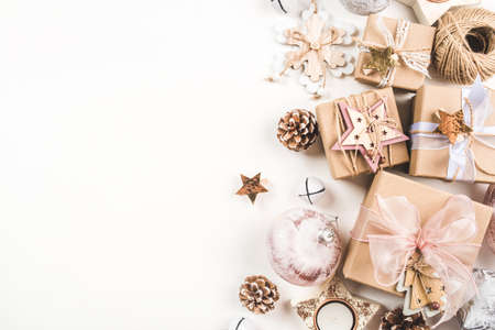 Festive Christmas background with different size gift boxes and Christmas decorations. Top view. Copy space for text.の写真素材
