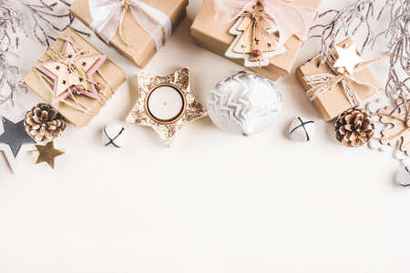 Festive Christmas background with different size gift boxes and Christmas decorations. Top view. Banner with copy space for text.の写真素材