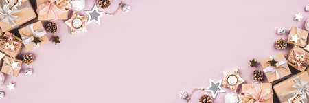 Festive Christmas background with different size gift boxes and Christmas decorations. Top view. Copy space for text.の写真素材