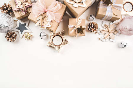 Festive Christmas background with different size gift boxes and Christmas decorations. Top view. Copy space for text.の写真素材