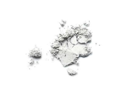 The texture of gray powder eye shadow or cosmetic clay isolated on white background.の写真素材