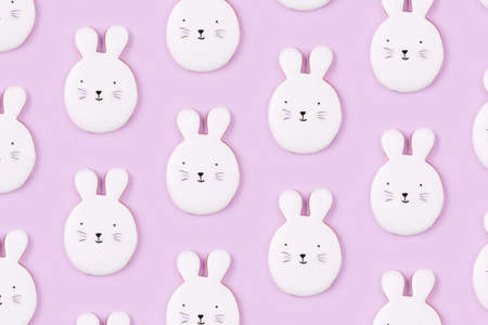 Easter bunny cookies on lilac background. Spring holiday.の写真素材