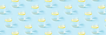 Summer pattern with glasses of lemonade on blue background.の写真素材