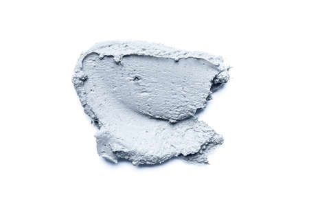 Smear of cosmetic clay isolated on a white background.の写真素材