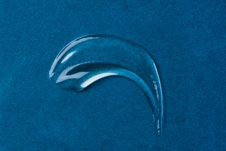 A smear of gel on a blue background.の写真素材