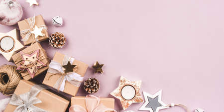 Festive Christmas background with gift boxes and Christmas decorationsの写真素材
