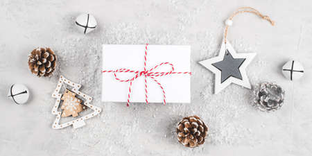 Festive Christmas background with gift box and Christmas decorations.の写真素材