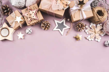 Festive Christmas background with gift boxes and Christmas decorationsの写真素材
