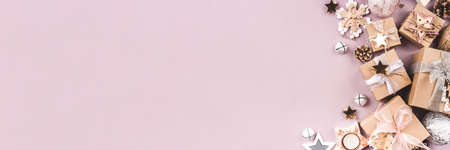 Festive Christmas background with gift boxes and Christmas decorationsの写真素材