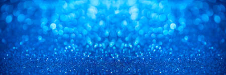 Blue sparkle background with bokeh.の写真素材