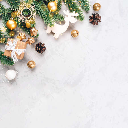 Christmas composition of fir tree branches and decorations.の写真素材