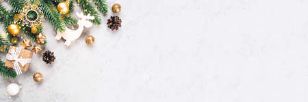 Christmas composition of fir tree branches and decorations.の写真素材