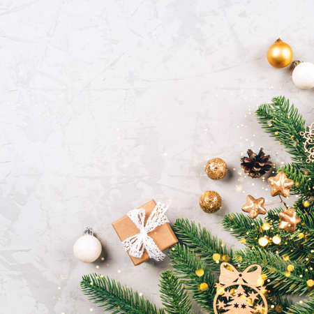 Christmas composition of fir tree branches and decorations.の写真素材