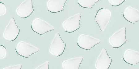 Smears of cream on a blue background.の写真素材